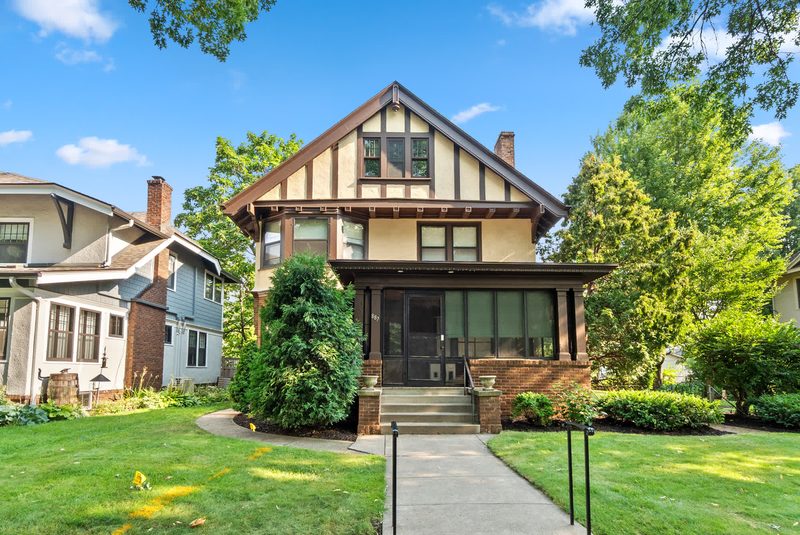 A Tudor style home on a summer day